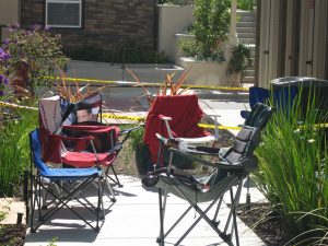 Camping chairs in front of the Parkwood sales office