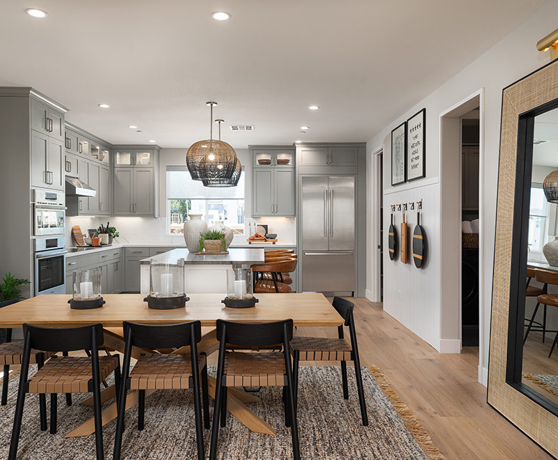 Image of a Homebuyer in front of a New Home